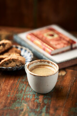 Cup of coffee and Cantuccini (Italian cookie) on dark wooden background. Copy space.	