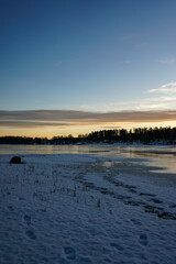 Naklejka premium sunset over the lake