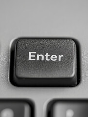 A close-up of an enter key on a keyboard.
