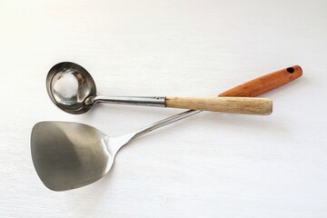 Spatula with Ladles on white background, kitchen ware
