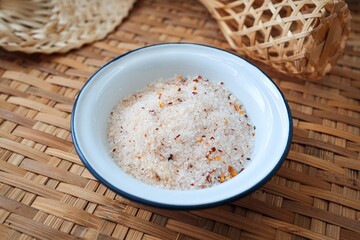 Thai Chili salt for dipping fruit on basket background