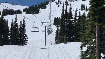 Invigorating View Of A Ski Lift Ascending A Pristine Snow-covered Mountain