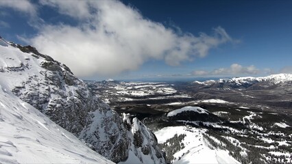 Spectacular Panoramic View Of A Mountain Range Seen From The Summit Of A Majestic Mountain