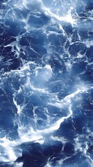 Obraz premium Abstract Ocean Surface with White Foam and Deep Blue Water Creating a Dynamic Texture