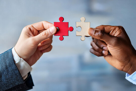 hands holding puzzle worker hold assemble jigsaw find best business solution option concept businessman connect pieces of puzzle think of problem solving