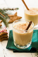 Homemade fresh eggnog with cookies