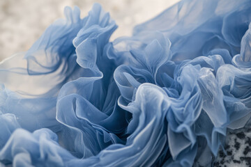 Obraz premium Chambray blue ink swirling in water, forming delicate, flowing patterns that create a soothing aesthetic.
