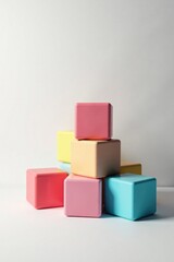 Fototapeta premium Shuffled cubes in white background with empty space, white decor, minimalist design, random layout