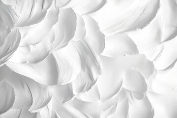 White abstract brushstrokes on canvas, overlapping to form a modern, artistic texture.