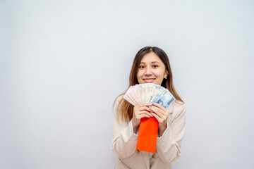 Taiwan girl Holding a Red Envelope with Money,Lunar New Year Red Packet with Cash,Bonus and Salary...