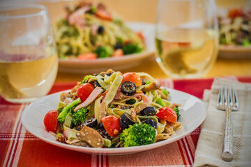 mixed vegetable pasta salad served with white wine