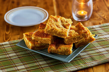 pumpkin cake squares on a plate