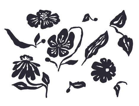 Set of black abstract inky flowers and leaves isolated on white. Monochrome sketchy textured loose floral doodles.