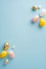 Decorative vertical Easter eggs arranged on a teal surface, symbolizing celebration and freshness © ActionGP