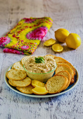 spicy seafood crab dip served with fresh lemon and parsley