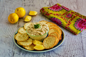 spicy seafood crab dip served with fresh lemon and parsley