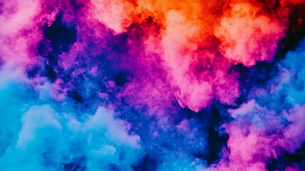 Vibrant swirls of blue, pink, and orange smoke create a mesmerizing abstract image.