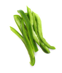 Sliced green bell pepper in a bowl on white background