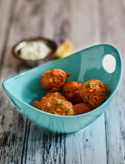 crispy fried seafood fritters served with tartar sauce