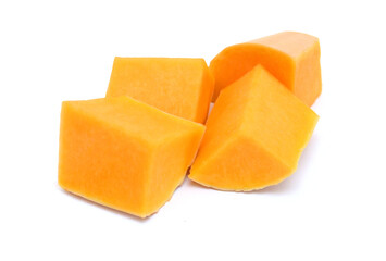 Slice butternut pumpkin and a cut one on a white background