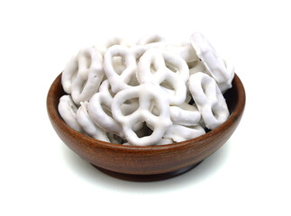 White chocolate covered pretzels on white background
