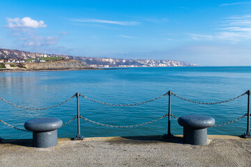 View from  the harbour towards Dover on a bright winters day in Folkestone, Kent, England