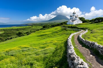 Serene coastal landscape showcasing a white church nestled amidst vibrant green hills, under a bright blue sky with fluffy clouds