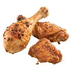 Grilled chicken legs with spices and garlic in closeup isolated on white background