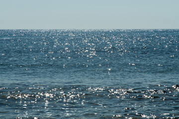 sea and horizon with the sunlight reflections