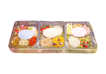 Prepackaged salads in packages on a white background