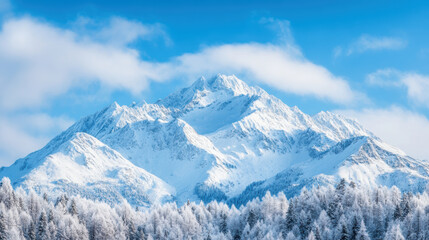 Obraz premium Snowy mountain peaks with clear blue sky in winter landscape serene nature scenery