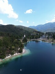 Bohinj Lake Beach with St. John the Baptist Church and Julian Alps, Slovenia