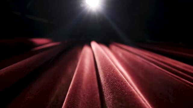 close up of a red curtain at a theater show