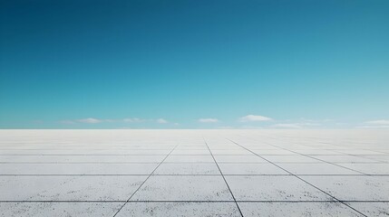 Empty White Concrete Floor Against Bright Blue Sky