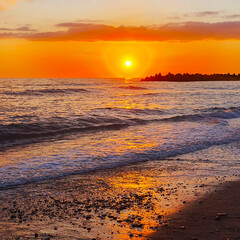 Sunset over the sea, sunset on the beach