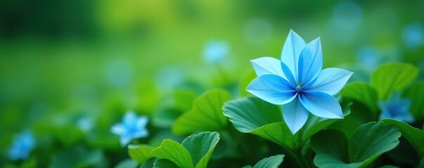 Delicate light blue flowers bloom amidst lush green foliage, nature, Kirigami flower