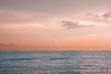 Fototapete sunset in the sea © Anton