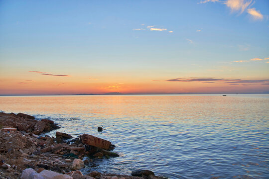 sunset over the sea in Patrs