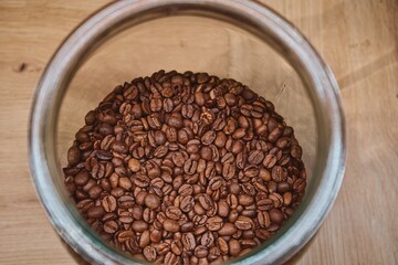 Top-Down View of Coffee Beans in a Glass Jar