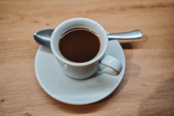 Cup of Black Coffee on Wooden Table