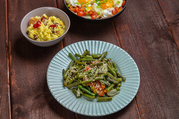 Jewish food tzimmes, chelnt, shakshuka and couscous with dried fruits