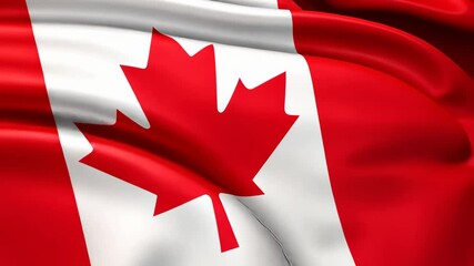 Aerial view of a waving Canadian flag, showcasing its vibrant red and white colors. The video captures the flag's dynamic movement and texture.