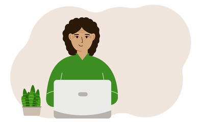 A woman is working or studying at a laptop. Freelancing or distance learning and work concept.