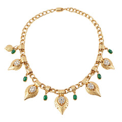 A gold necklace with leaf pendants adorned with diamonds and green gemstones, shown against a cut out background.