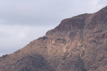 mountains in the desert on a cloudy day