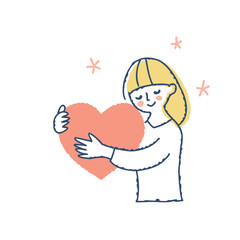 大切そうにハートを抱く女性