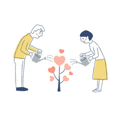 ハートの木に水をやる男女