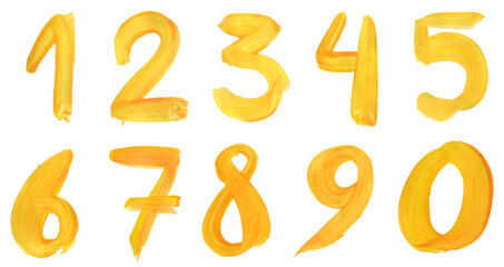handwritten numbers carelessly drawn with yellow paint