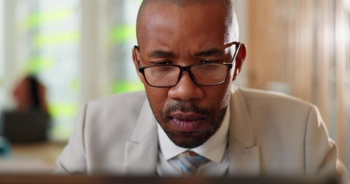 Research, serious and man with laptop, office and online for insurance rates, reading and actuary. Corporate, financial report and analysis for investment, web and black person with info for business