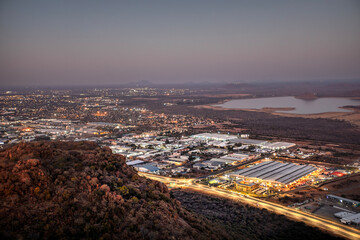 aerial view of Gaborone at night, capital city, view from Kgale Hill ,Botswana, dusk night industrial , business and residential area, highway between towns